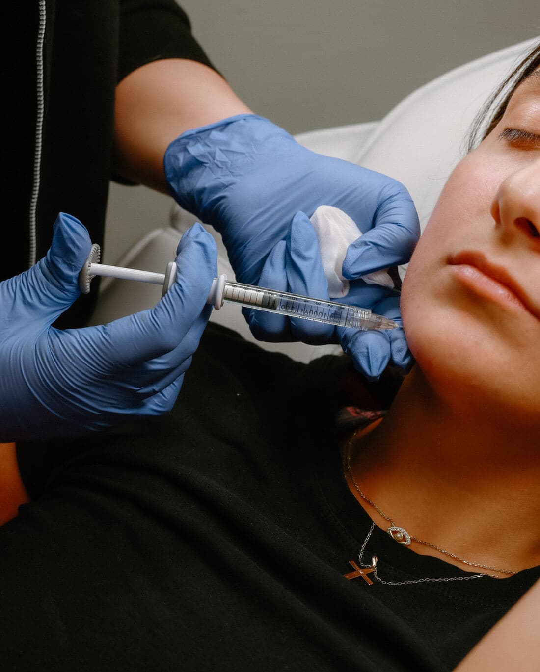 Close-up of a patient during a dermal filler appointment at The Beauty Spot Medspa.